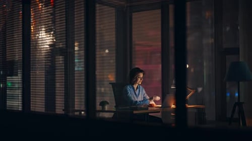 Overtime Employee Massaging Temples Sitting Night Office Tired Businesswoman
