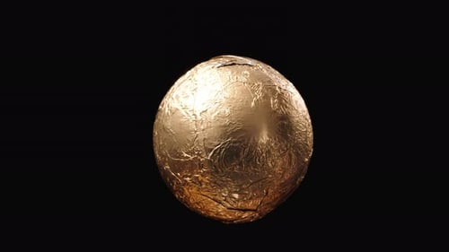 Rotating Gold Egg Object on Black Background