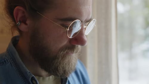 Man with Beard and Glasses Close Up Indoors