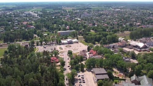 A stunning aerial view of Sigulda city, highlighting its integration with lush green spaces and natu