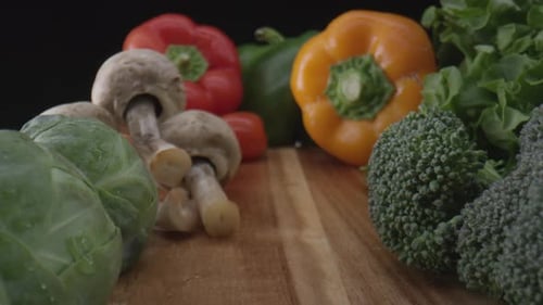 Close Up of Delicious Fresh Vegetables on Wood