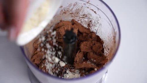 White Powder Added to Brown Chocolate Mix