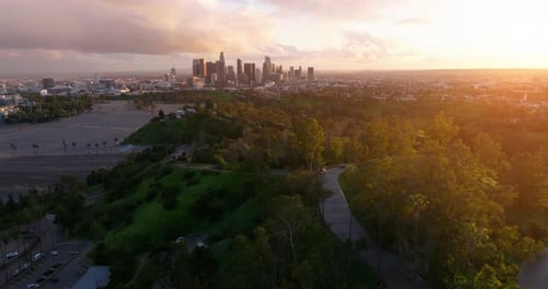 Epic Los Angeles downtown view on pink cinematic sunset.