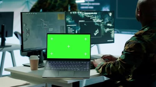 IT Expert Collecting Real Time Information Next to Isolated Chroma Key Screen