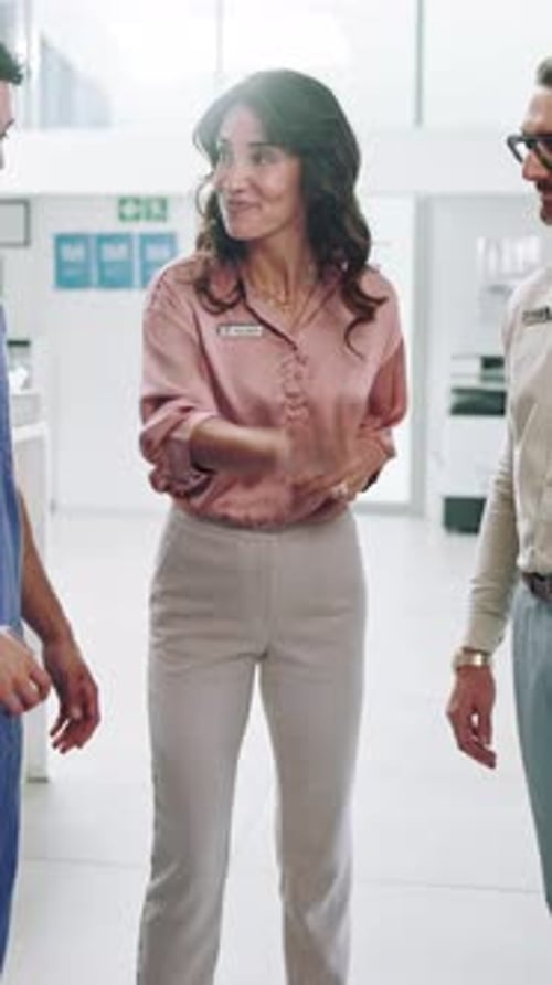 Woman, doctors and hands stack with celebration, applause and excited with team goals at hospital