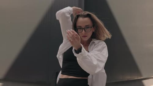 Woman Dances in an Urban Environment
