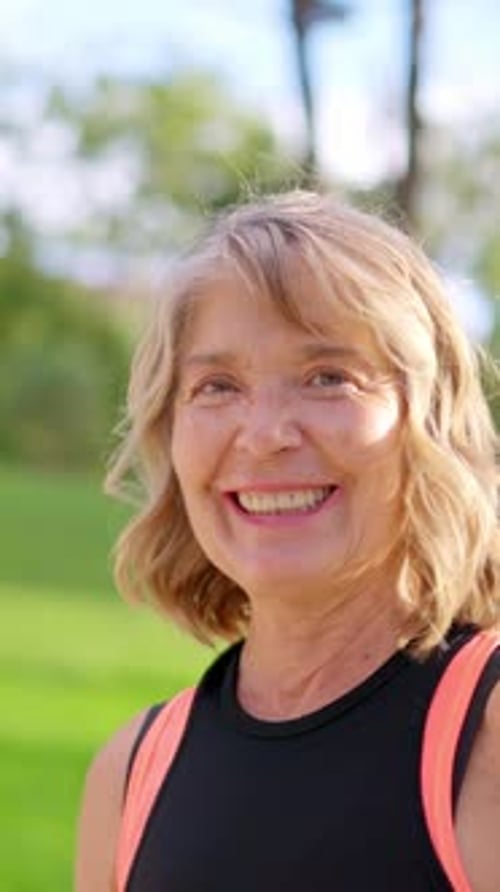 Happy Smiling Senior Woman Enjoying Outdoors