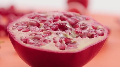 Fresh Pomegranate Fruit On Wooden Table