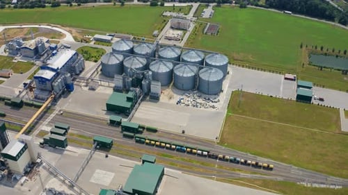 Farm grain silos for agriculture. Aerial view of agricultural silos, grain elevator for storage