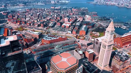 Old park of Boston with stunning architecture. Boats on the waterscape of the Charles River