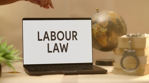 LABOUR LAW DISPLAYED IN LEGAL LAPTOP SCREEN