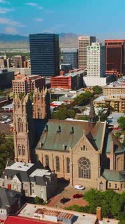 Historic building of a Cathedral of Madeleine locating among the modern architecture.