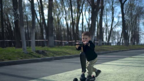 A Child Happily Riding a Colorful Scooter in a Vibrant Park Setting Filled with Greenery
