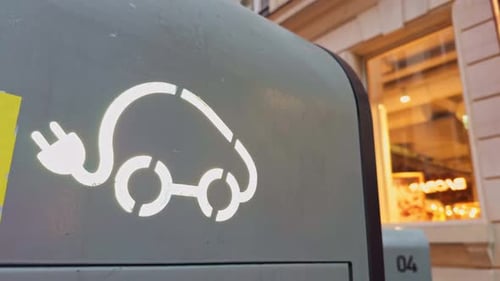 Electric car charging station signage in city