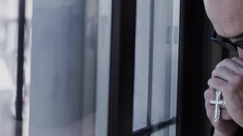 Man Is Holding Christian Jesus Religious Symbol Cross For Pray 1