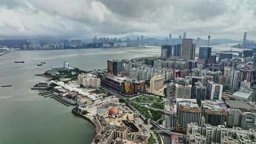 An aerial view of a city and a body of water