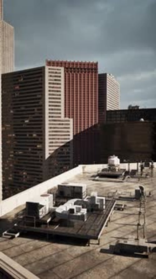 Smooth Vertical Dolly Shot Over Modern City Rooftop