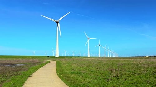 Windmill Park in the Netherlands in Spring View of Windmill Turbines Generating Green Energy