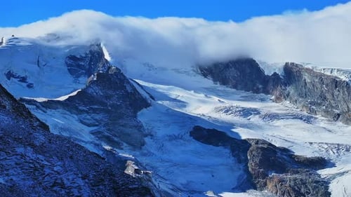 Morning blue bird clear sky sunny cloud fog layer glacier glacial crevasse Saas Fee Saastal Zermatt
