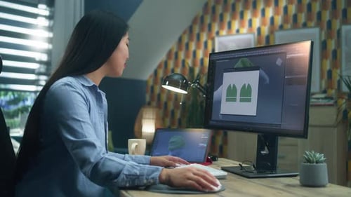 3D Designer Creating Clothes on Computer