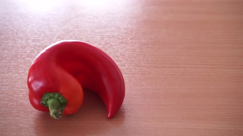 Red Pepper Isolated Close Up on Table Top