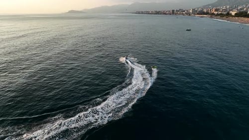 Sports Boat Sails and Makes Beautiful Turns Aerial View 4 K