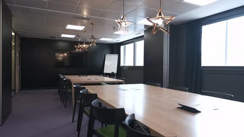 Interior of Spacious Office with Tables and Chairs
