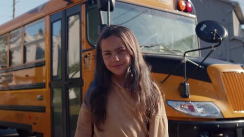 Caucasian Girl With Backpack Near Bus First Day Of School Portrait