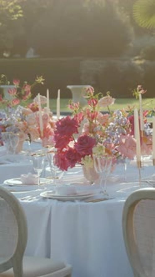 Wedding Table Setting with Elegant Floral Arrangements Outdoors
