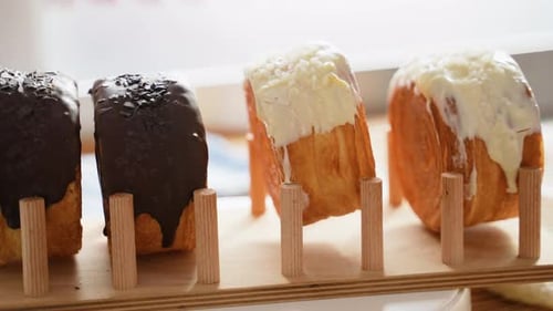 Freshly Baking Spinning Baked Goods on Display in Baker Shop