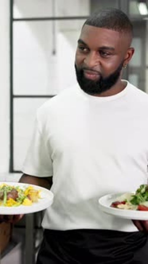 Man, waiter and happy with plate, serving and meal with cuisine, job or career at restaurant