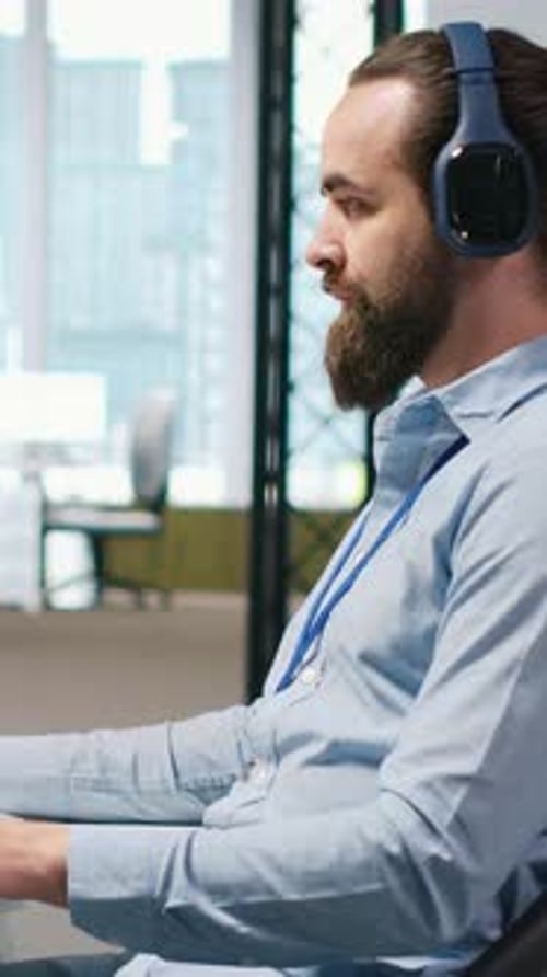 Vertical Video Developer Coding with AI Language Model Assistance in Office Listening Music