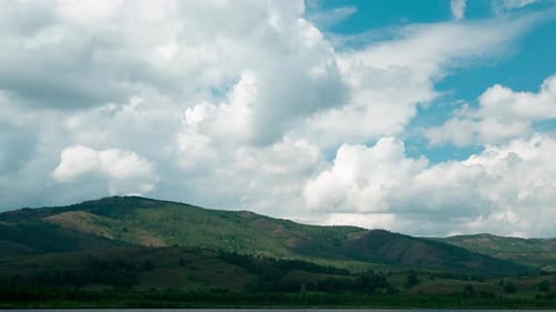 Clouds Flying Over Mountain