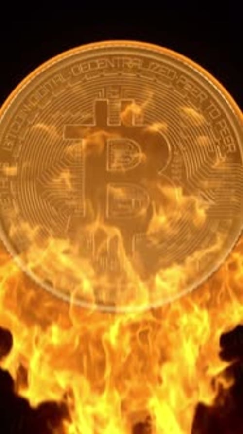 Golden Bitcoin Crypto Currency Burning in Flames