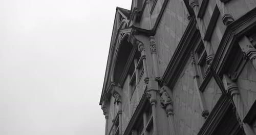 Monochrome View Of The Wooden Architecture Facade Of Maison d'Adam In Angers, France. Low Angle