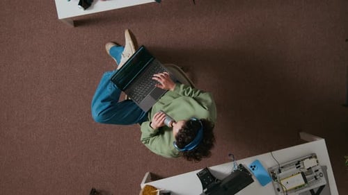 Person With Laptop Working At Home