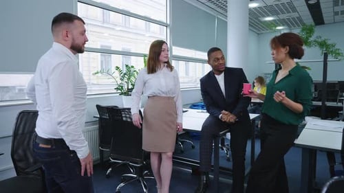 Diverse Team Having Coffee Break in Office