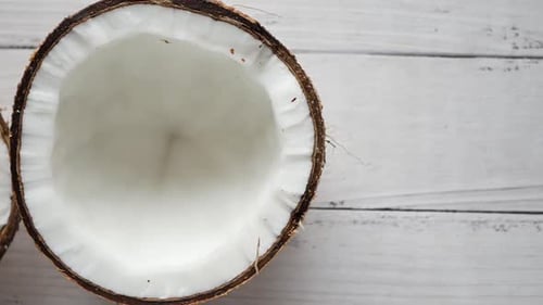 Slice of Fresh Coconut on a Table Cloth