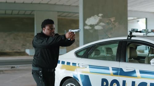 A Police Officer Actively Engaged in Action with a Firearm in a City Environment