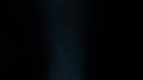 Flow Stage of Formless Smoke Swirling Against a Black Background