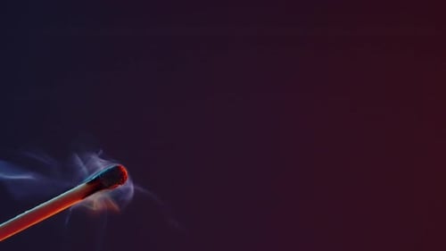 A Burning Match Goes Out and Leaves White Smoke