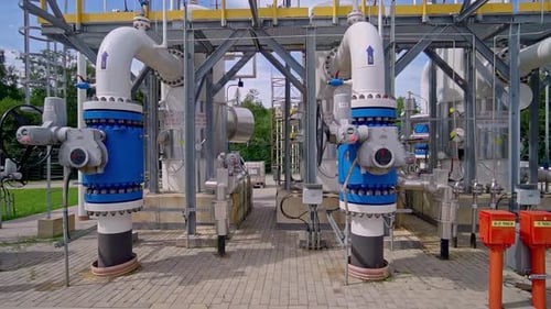 Trucking Shot of a Modern Natural Gas Pumping Station and Pipeline in Latvia