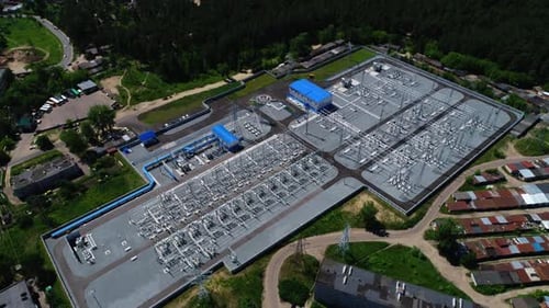 Electricity Substation with Power Lines and Buildings