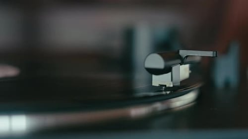 Vinyl Record Spinning on Turntable Close Up
