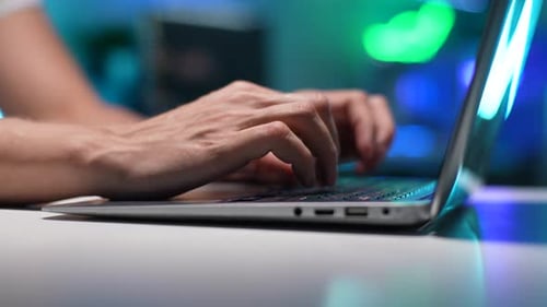 Closeup Hands of Unrecognizable Freelancer Developer Male Typing Program Code on Laptop Keyboard in