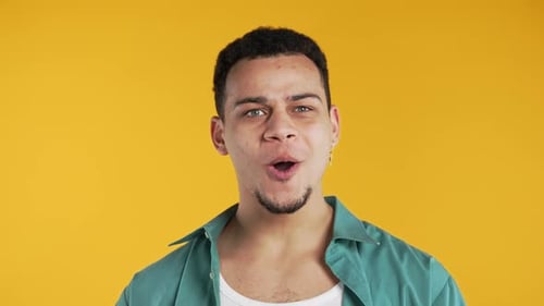 Man Making Surprised Expressions and Laughing