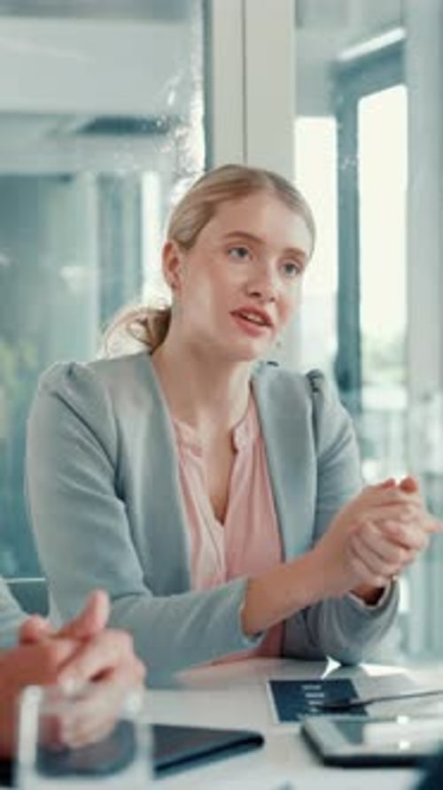 Business, woman and talk in meeting in office for financial planning, feedback or budget review