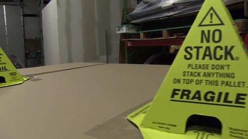 Safety Cone on Pallet in Warehouse Warning No Stack