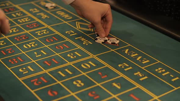 Hands Placing Bets on a Roulette Table, Buildings Stock Footage ft ...