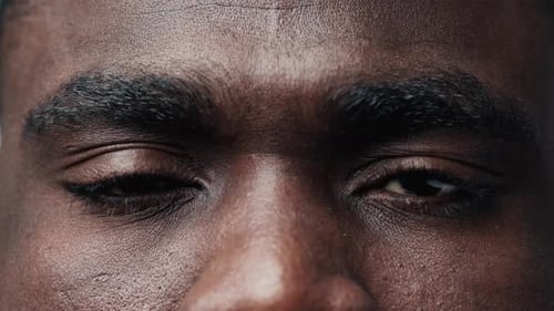 Extreme Close Up of Person's Eyes Opening